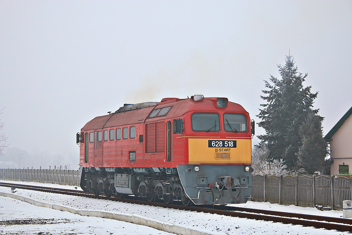 628 518