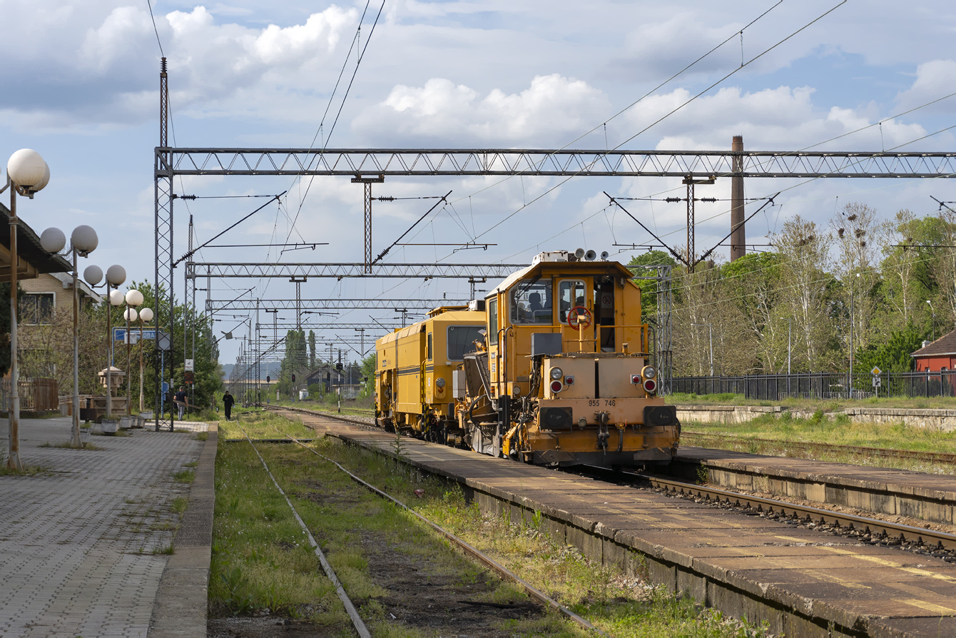 955-746