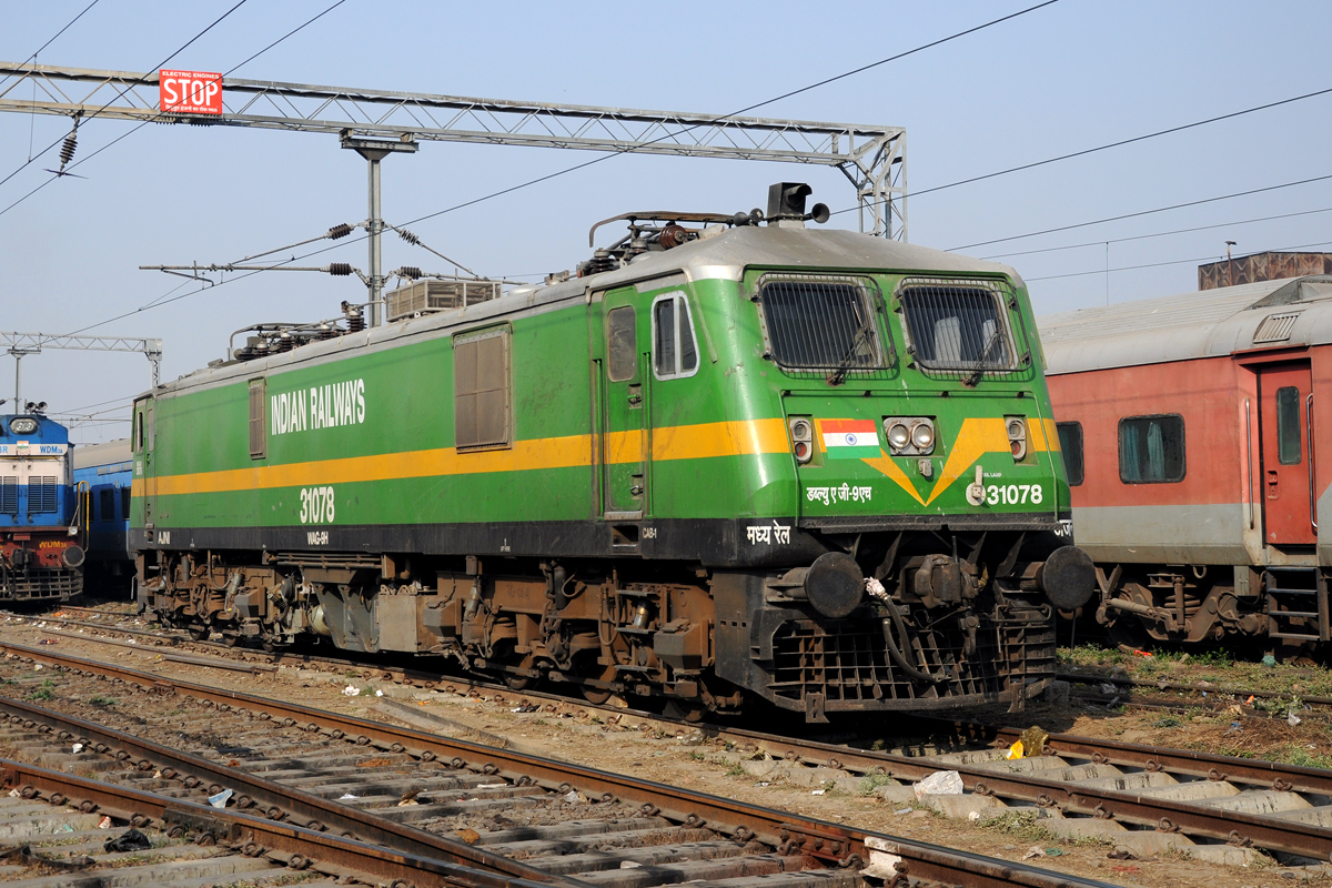 31078