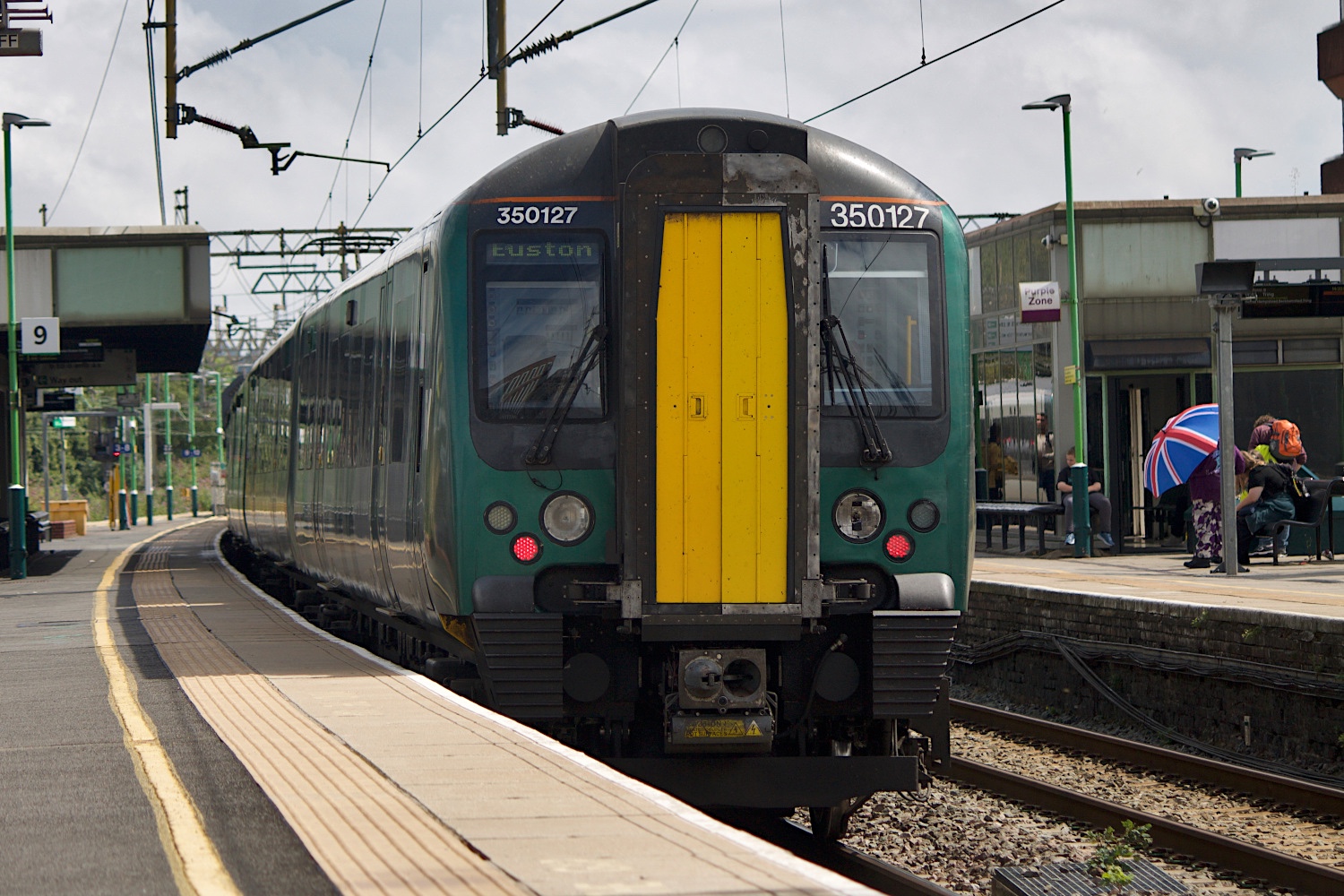 350127