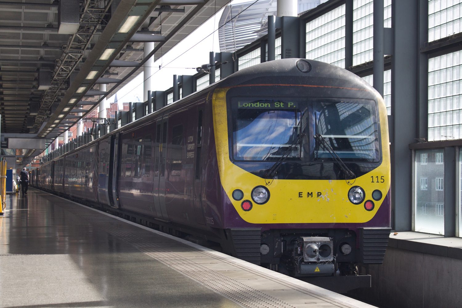 360115