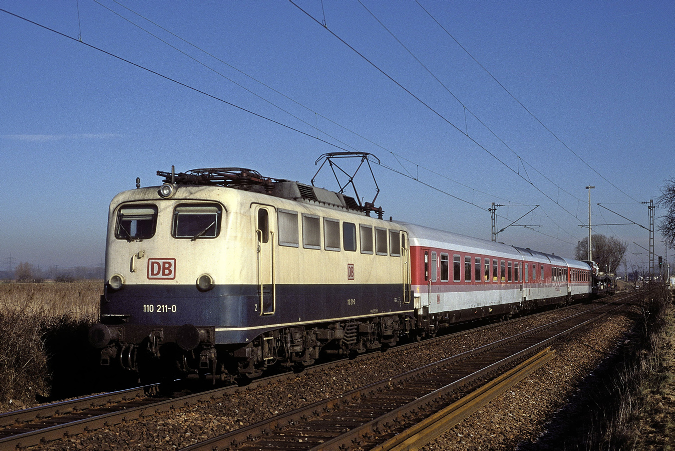 110 211-0