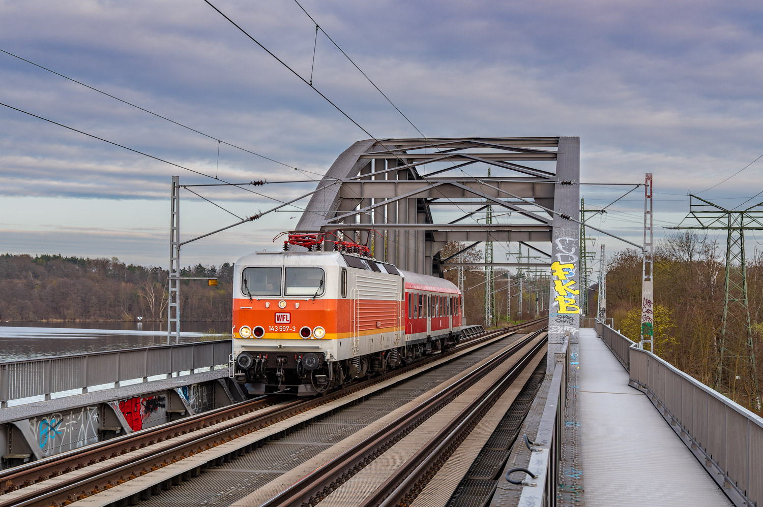 143 597-3