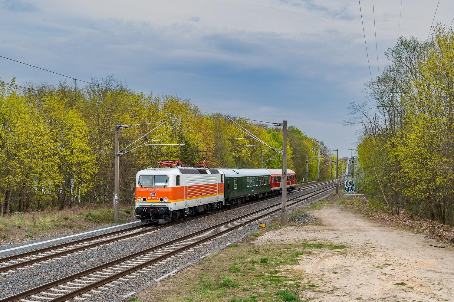 143 597-3